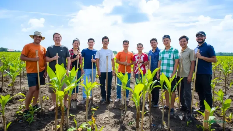 A local community celebrates a tree planting project, illustrating the social impact of non-profit tree planting websites like Eden Reforestation Projects.